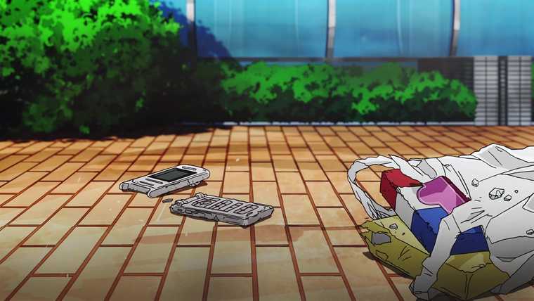 A broken phone on the ground by a discarded grocery bag