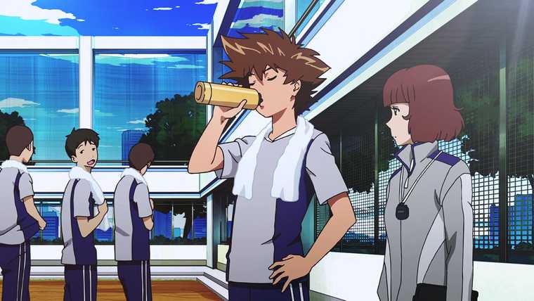 Tai drinks some water during a break from soccer practice