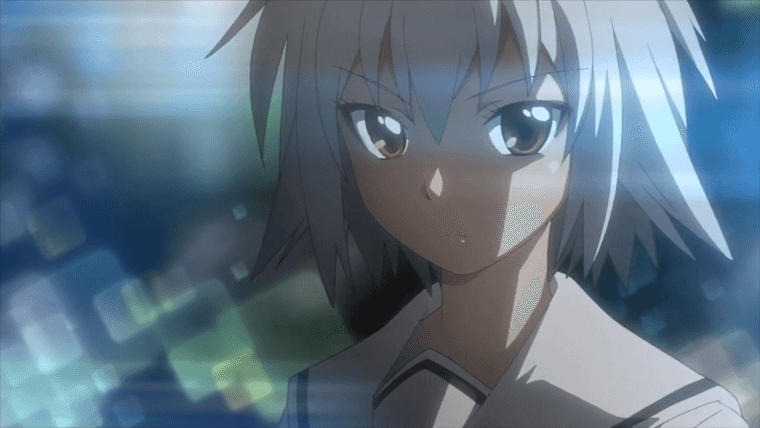 Portrait of a young woman with short blue hair