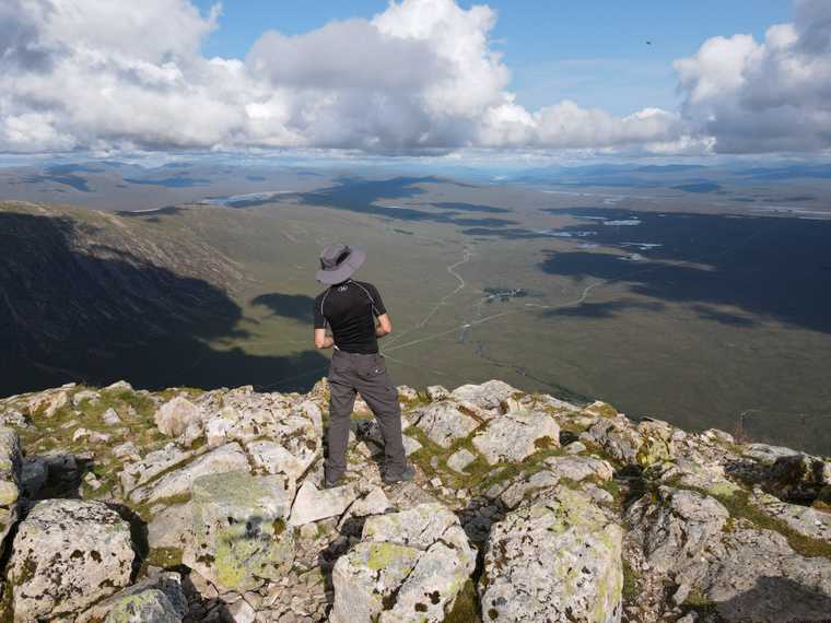 "A man looking over Rannoch Moor from the top of Stob Dearg, Buachaille Etive Mòr"